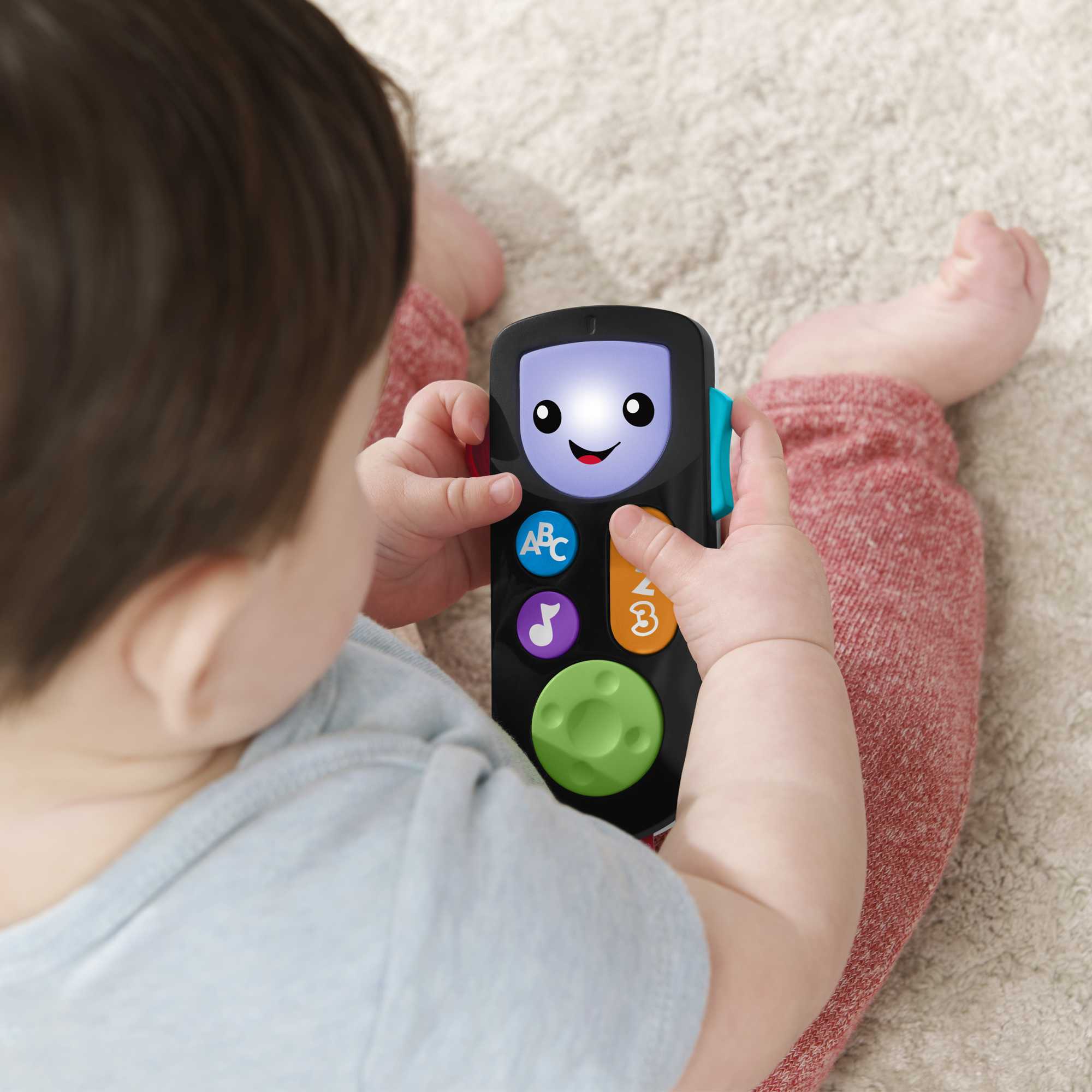 Fisher-Price Rires et Éveil Télécommande Sons et Apprentissage Version Anglaise et Française
